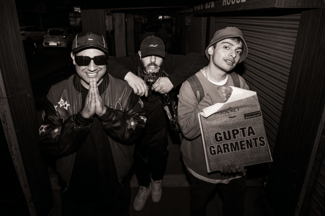 pataka boys standing together in a black and white shot.